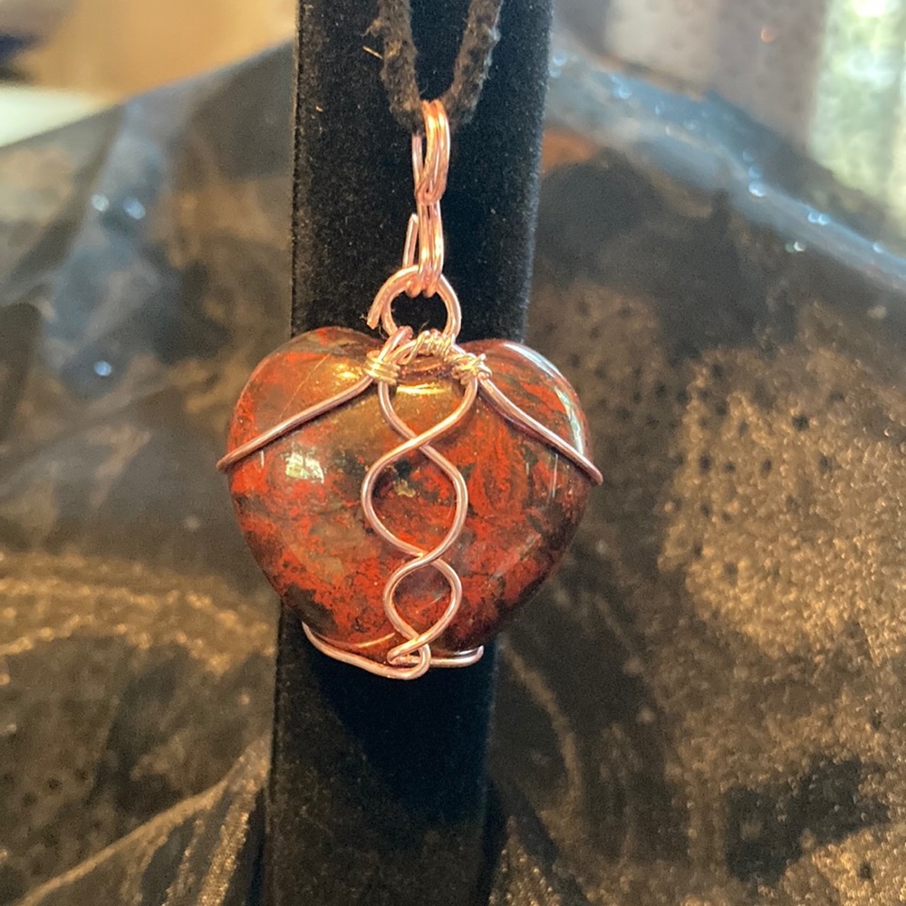 Heart stone wire wrapped pendant.